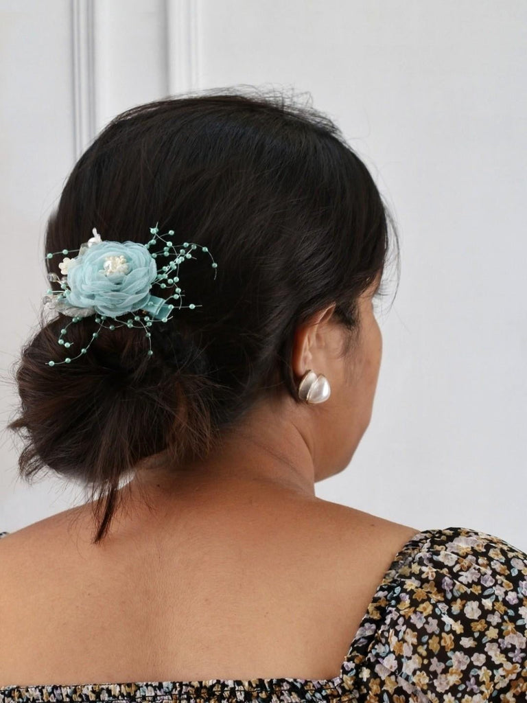 Yellow Bee Blue Rosette Hair Clip with Sparkling Rhinestones and Pearls Showcasing its features.