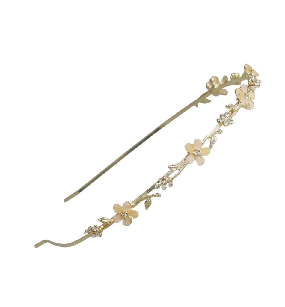Yellow Bee's acrylic flower hairband and rhinestone leaf hair clips in a delightful golden, peach, and white palette.