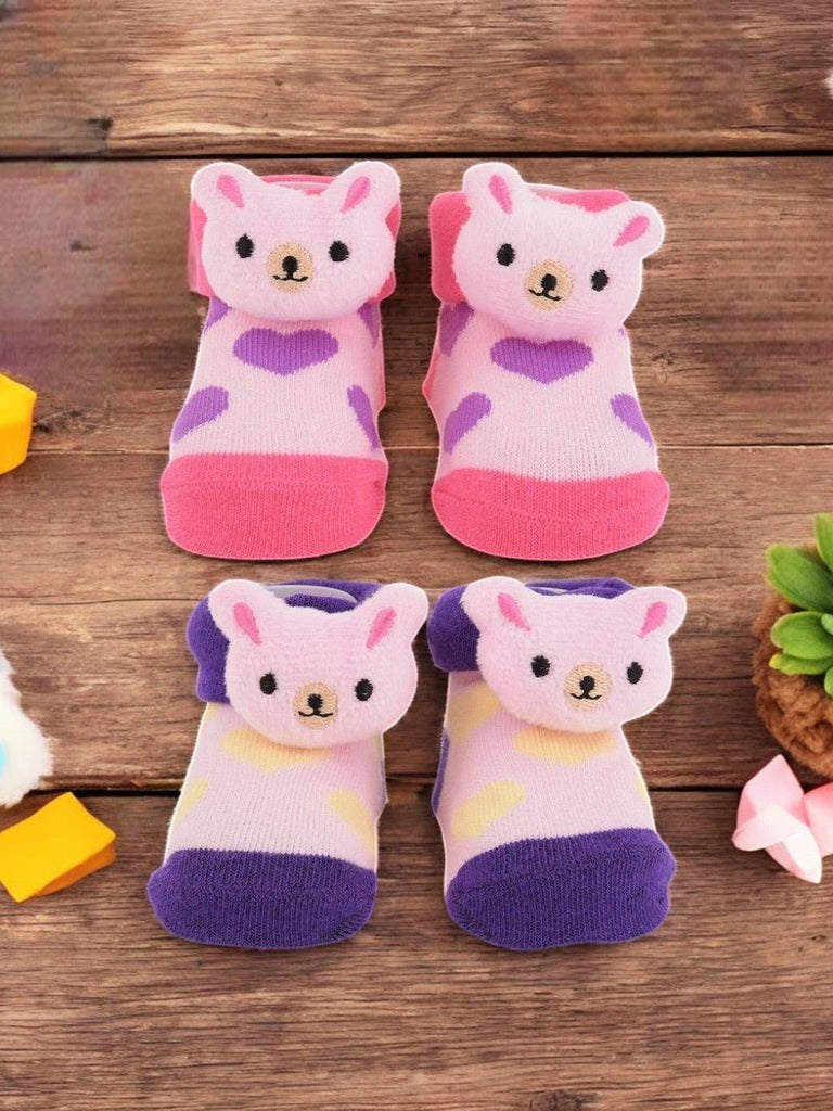 Baby Girl’s Bunny Face Socks in pink and purple combo pack creative view.