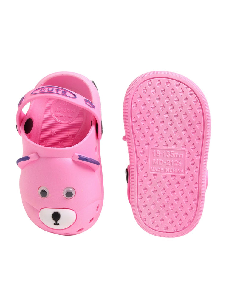 Side view of pink children's clogs with bear face, showing the soft insole and ventilation holes.-back