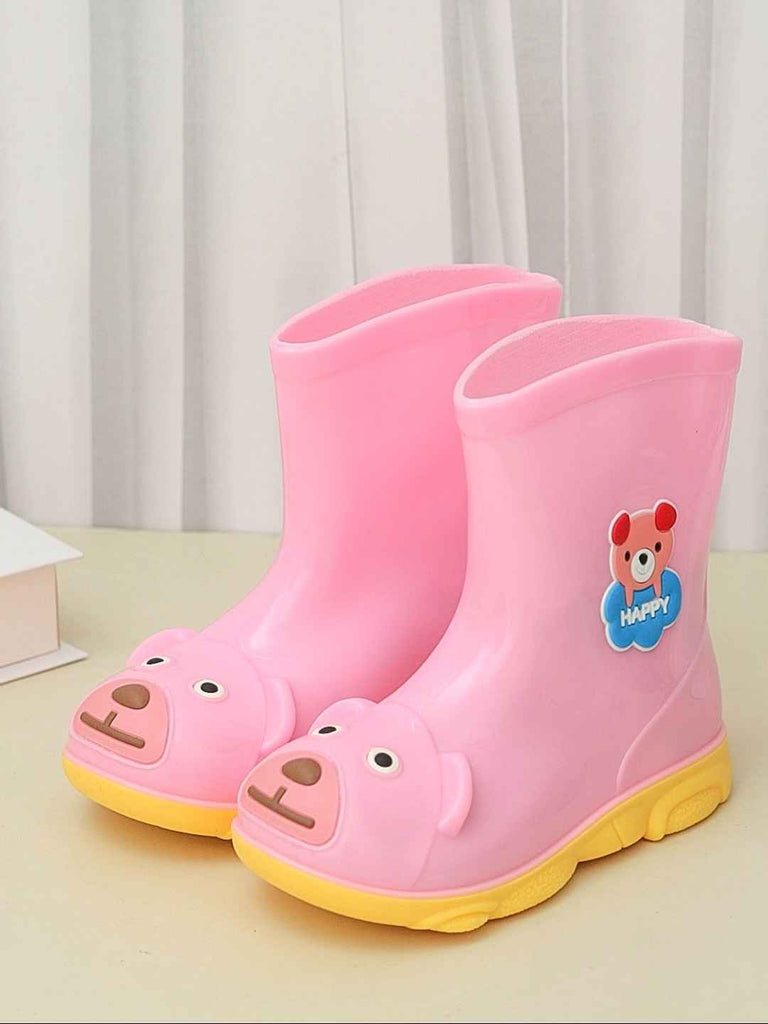 Creative display of Yellow Bee Pink Bear Themed Rain Boots for Girls.