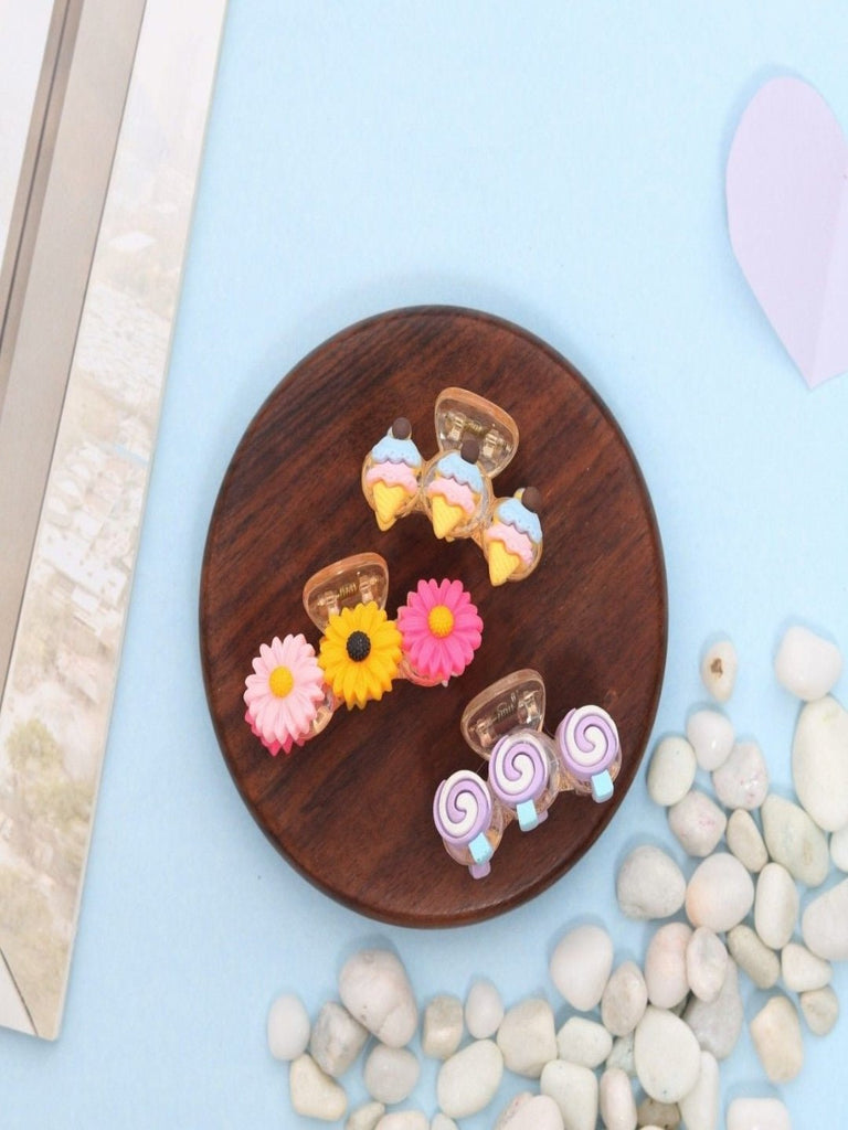 Creative display of Yellow Bee hair clutchers, showcasing their playful designs and colors.