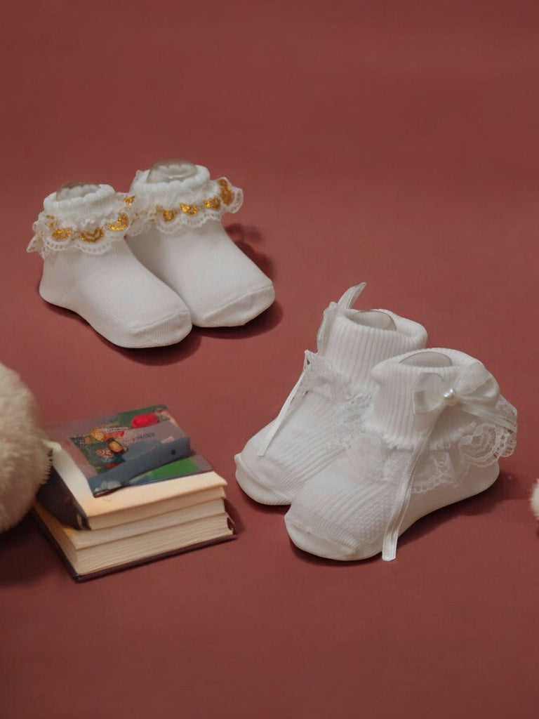 Creative view of Baby Girls' White Lace and Gold Trim Socks Set by Yellow Bee.