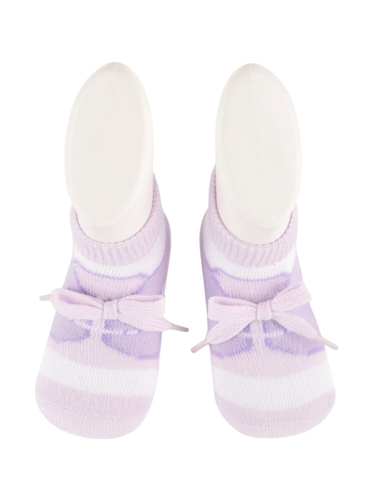 Front view of baby’s purple ballet style socks featuring a bow accent.