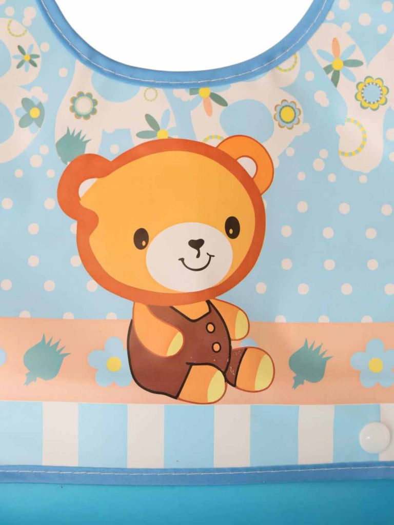 Bear Buddy Baby Bib – Cartoon Teddy Design on Blue Waterproof Bib with Food Catcher - Close Up View(i)
