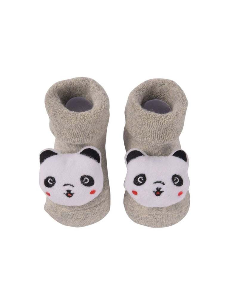 Top view of beige baby booties with 3D panda face design.