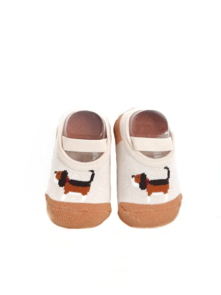 Top view of Beige Baby Socks with 3D Puppy Design, highlighting the snug fit and elastic cuffs for a secure fit.