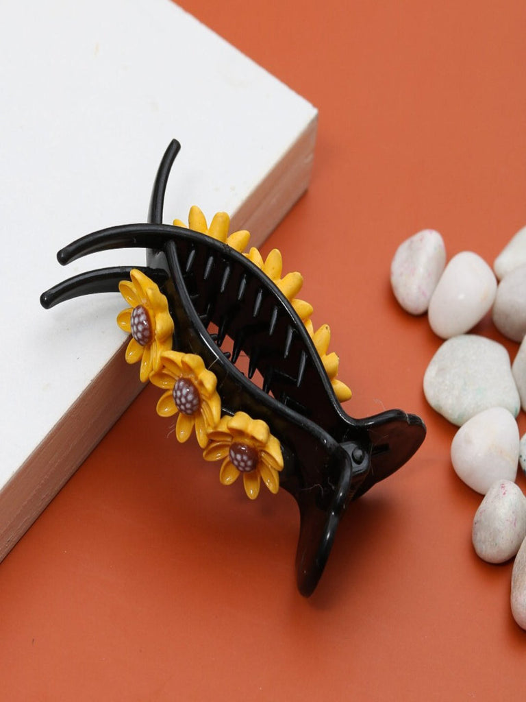 Creative view of Black Hair Claw Clip with Bright Sunflower Embellishments by Yellow Bee.