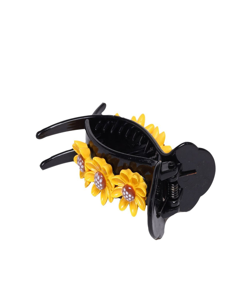 Side view of Black Hair Claw Clip with Bright Sunflower Embellishments.