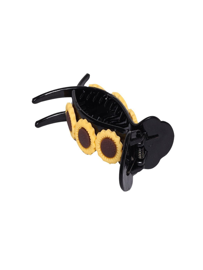 Side view of Black Hair Clip with detailed sunflower designs.