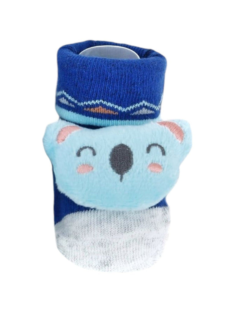 Close-up view of blue baby booties with a 3D koala design, perfect for keeping babies’ feet cozy and comfortable.