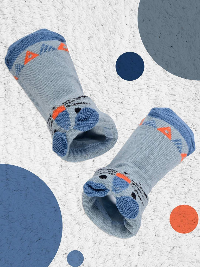 Creative Display of Blue Baby Socks with Playful Cat Face and Triangle Pattern