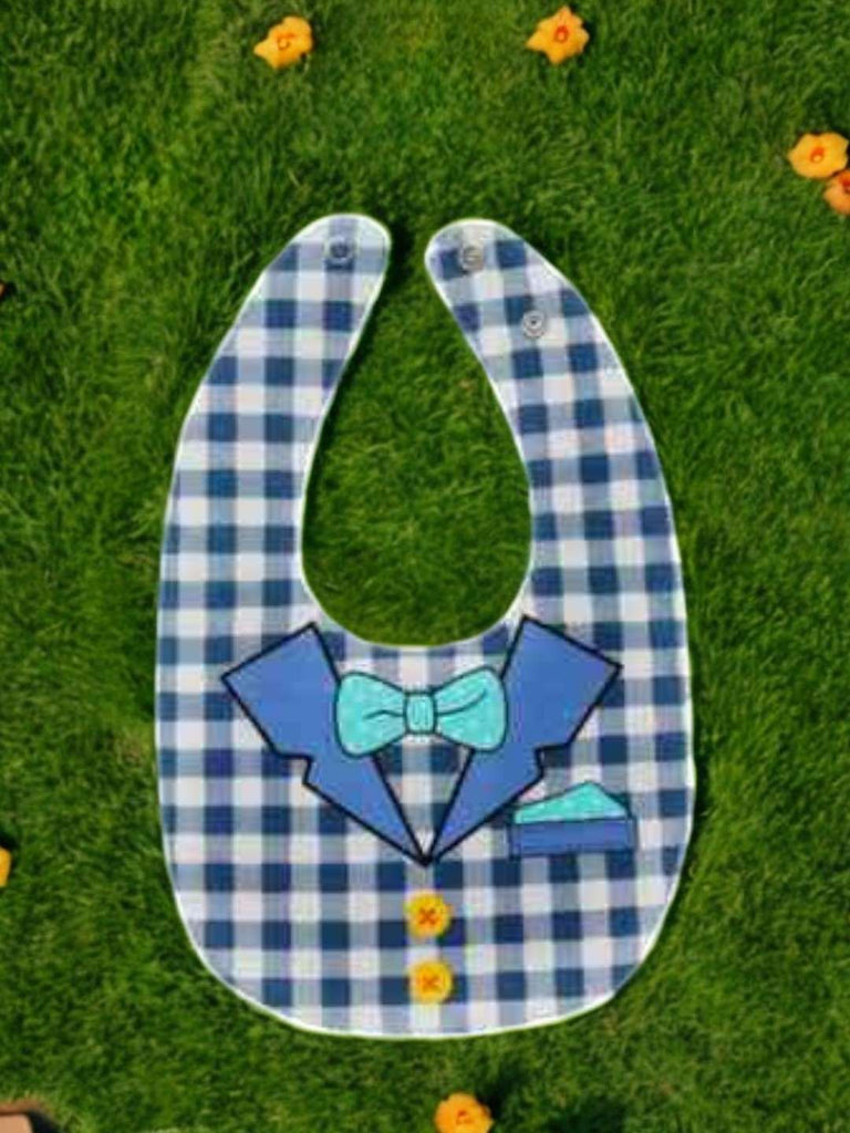 Creative display of the Blue Checkered Bow Tie Cotton Baby Bib for Boys, showcasing its playful design...