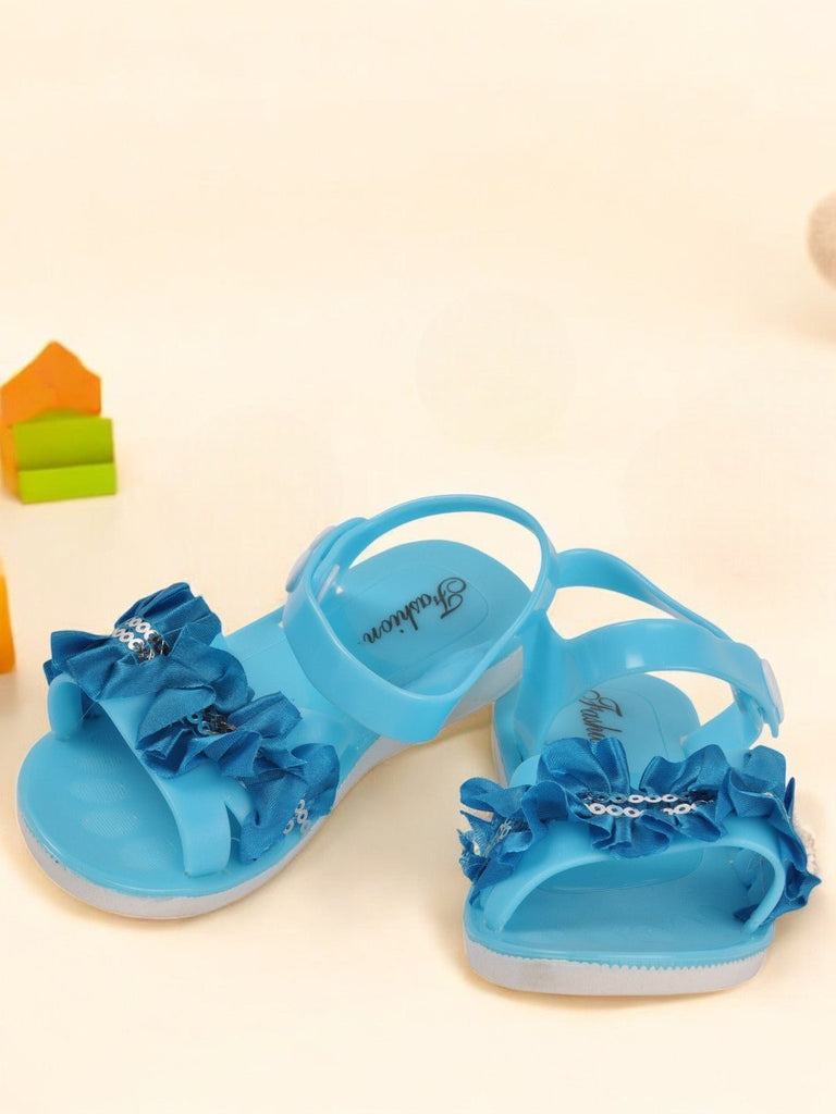 Blue fashion sandals with ruffled bow and sequin detailing – creative view