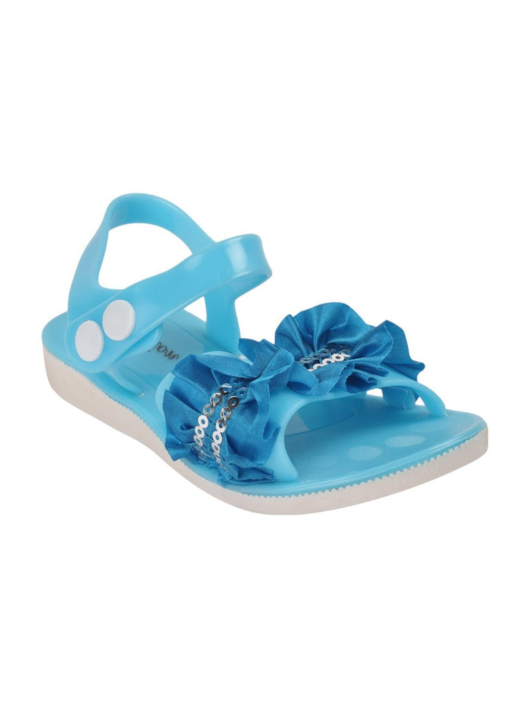 Blue fashion sandals with ruffled bow and sequin detailing – angle view