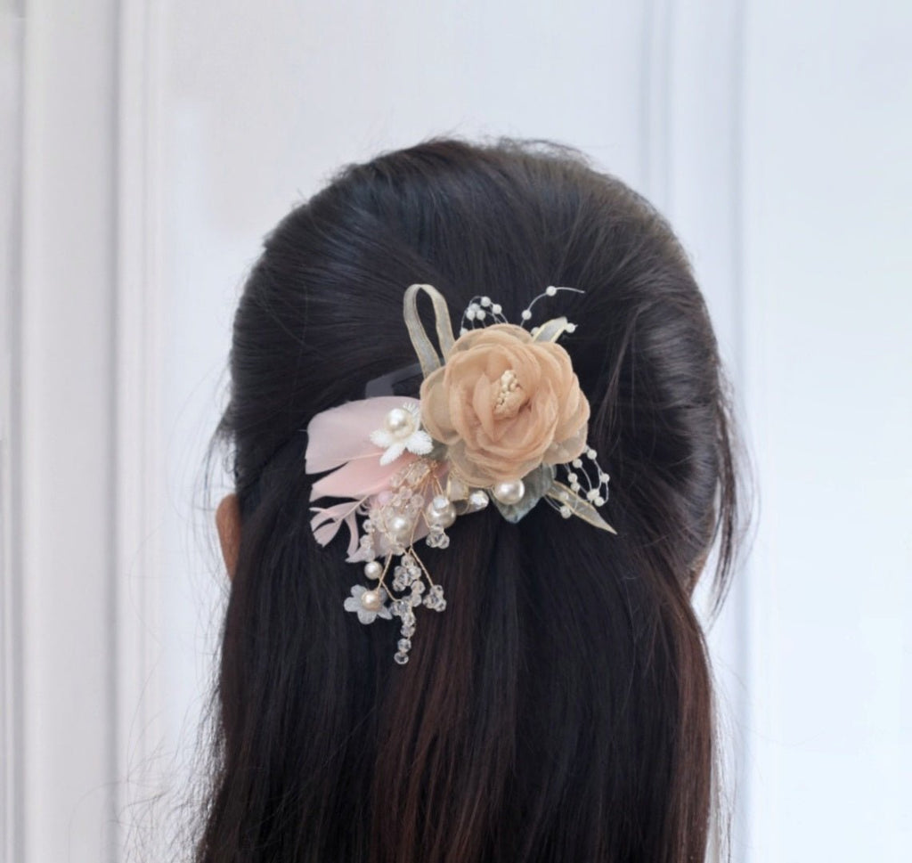 Beige and Pink Rosette Hair Clip by Yellow Bee on a Wooden Backdrop - Ideal for Elegant Bridal Styles