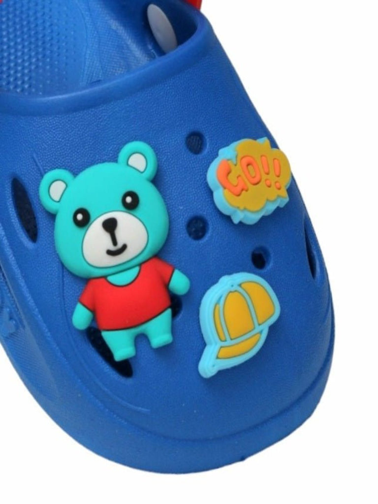  Close-up view of the Yellow Bee Boy's Blue Teddy Bear Adventure Clogs, focusing on the detailed rubber sole and cute bear accents.