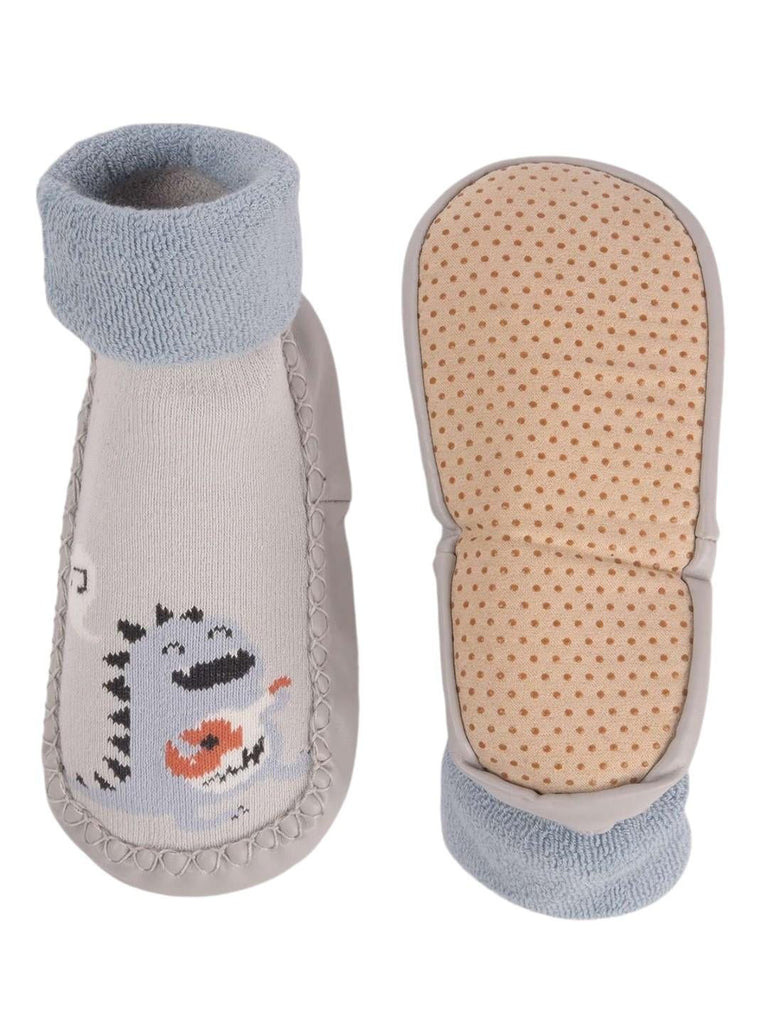 front and back view of Baby Dinosaur Face Moccasin Socks showing the cute dinosaur print.