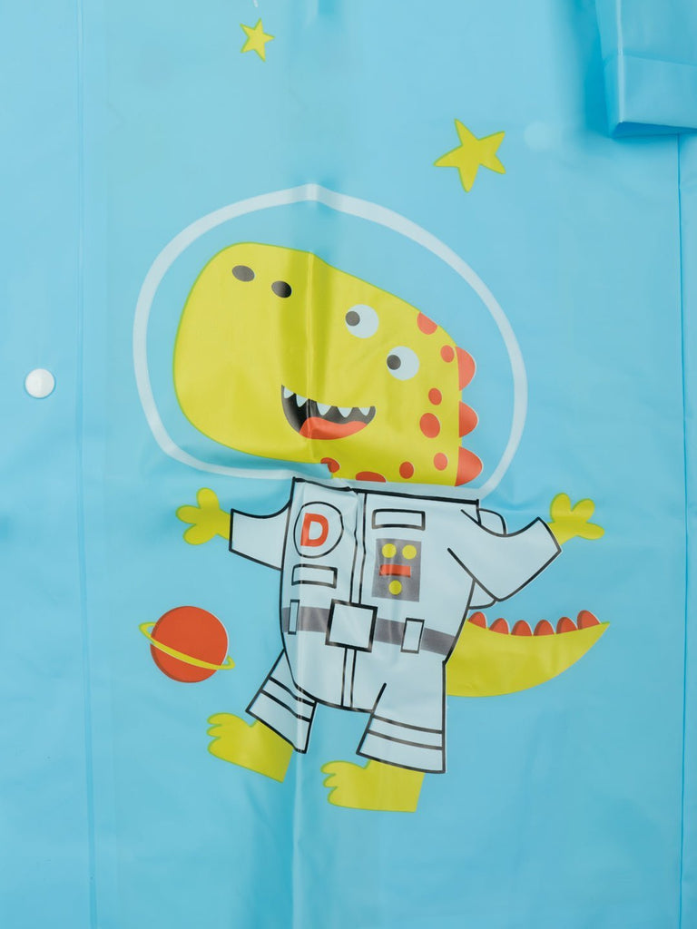 Detailed view of the dino astronaut graphic on the Yellow Bee boys' sky blue raincoat.