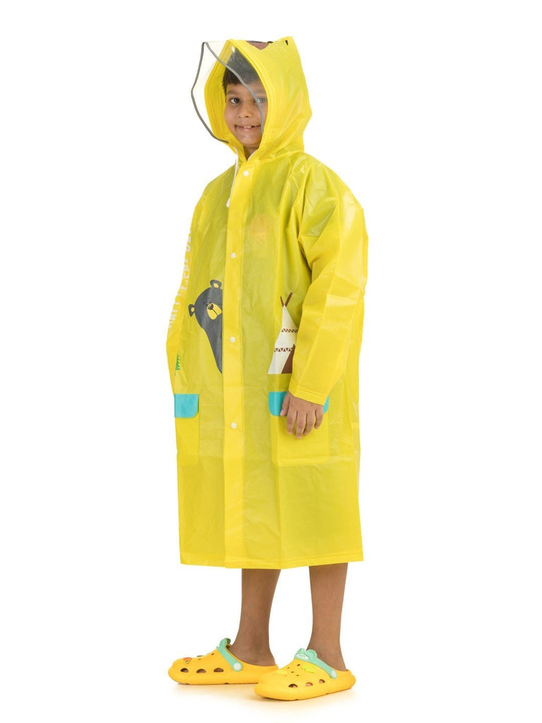 yellow bee adventure raincoat with bear hood and playful print angle view.