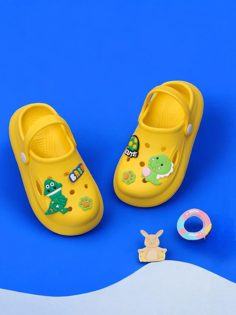 Yellow clogs with dinosaur and ice cream decorations for boys by Yellow Bee.