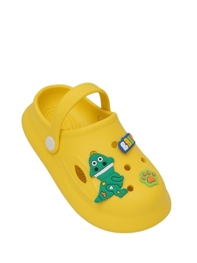 Angle view of Yellow Bee's bright yellow dino clogs with charming decorations.