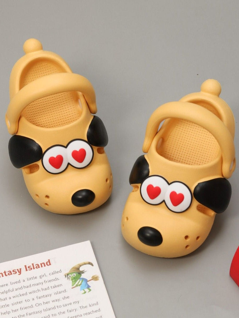 Creative setting of Yellow Bee's Bright Yellow Puppy Love Clogs with a storybook, illustrating the fun and playful nature of the clogs.