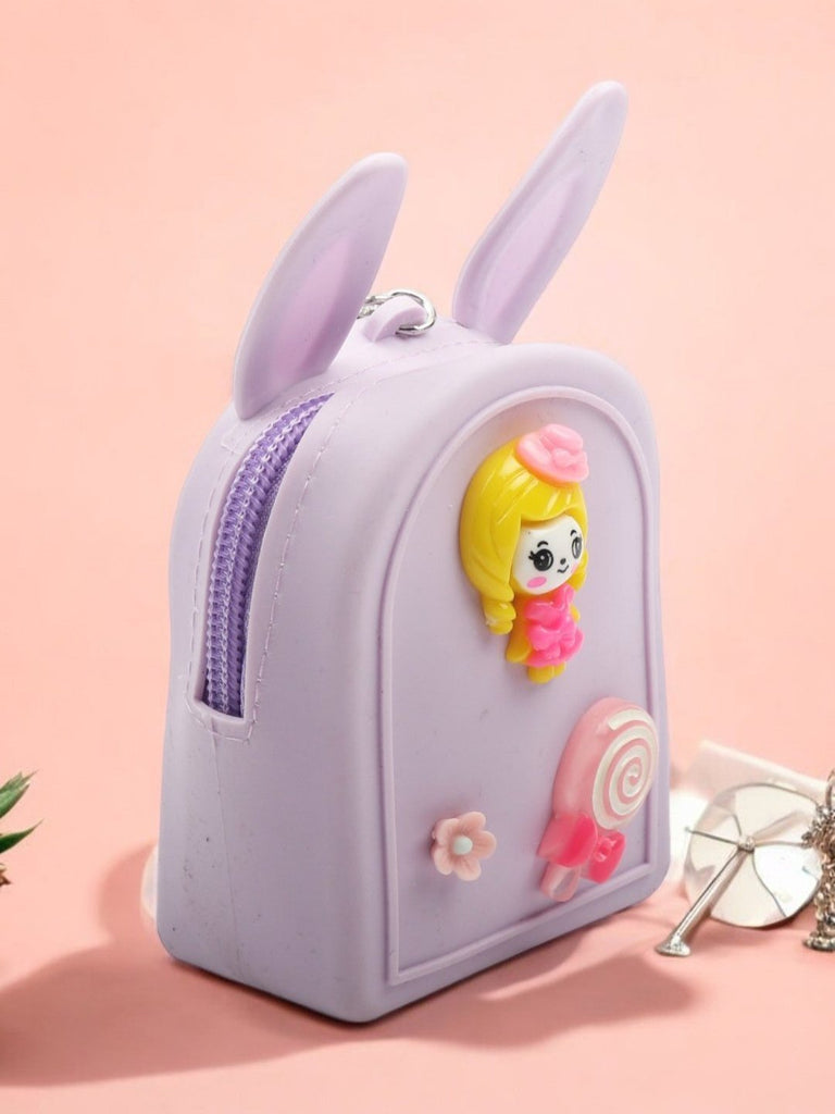 Creative view of Lilac Bunny-Eared Coin Pouch with a cute doll and candy design, styled with props.