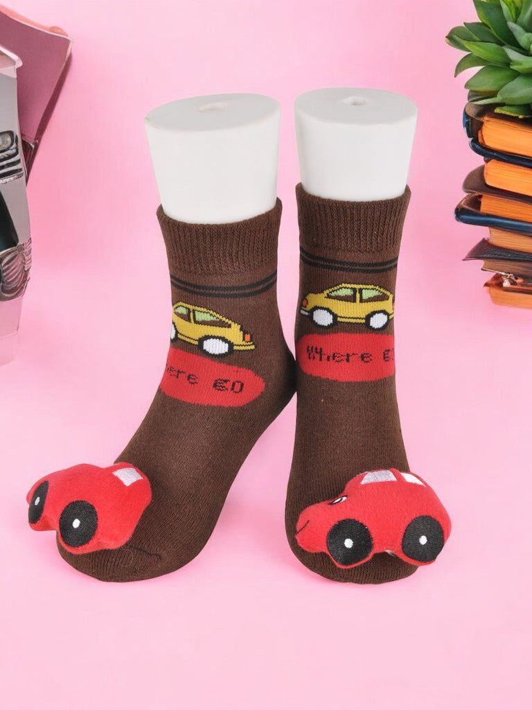 creative view Brown toddler socks with a bright car stuffed toy and 'Where to?' text design.