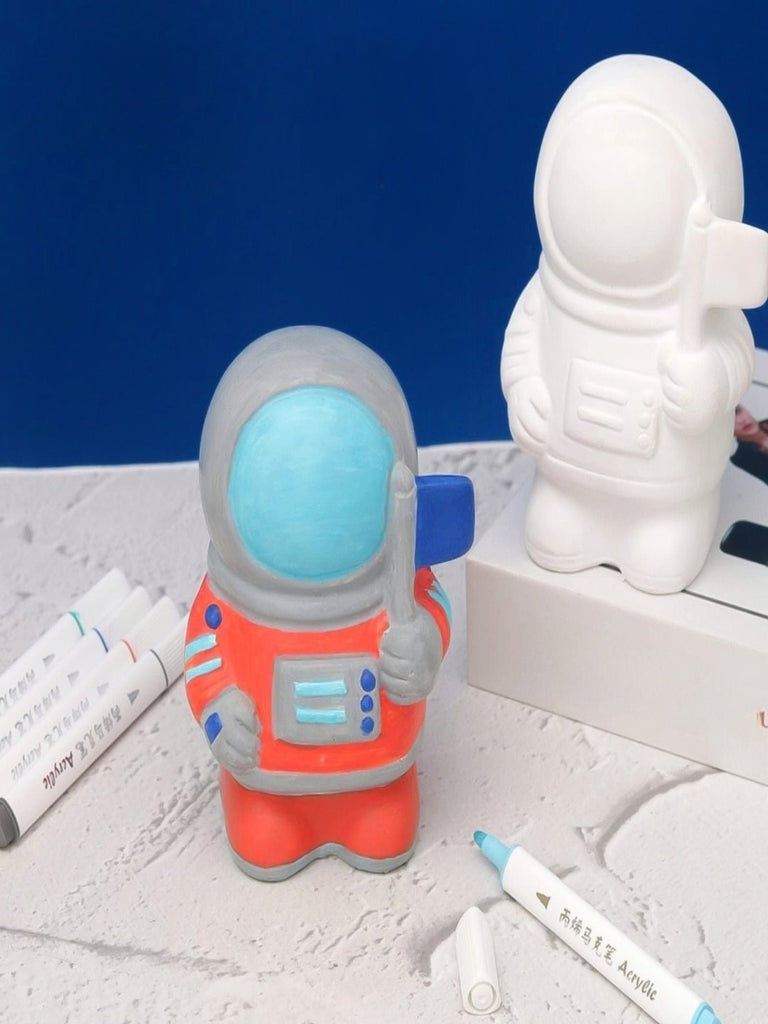 Creative view showing the finished and unfinished astronaut model, displaying the vibrant colors.