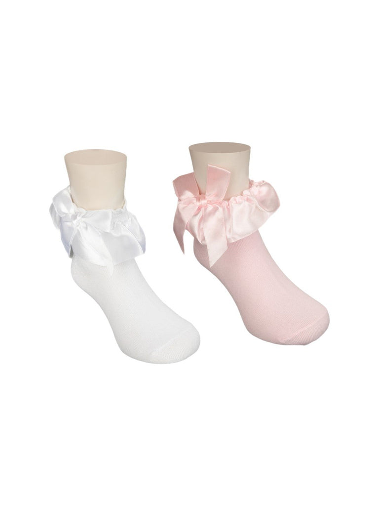 Pair of baby socks in pink and white with satin bows around the ankle, displayed in an angle view.