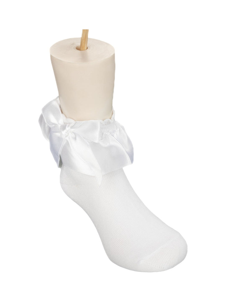 White baby sock with satin bow, displayed from the side showcasing the satin detail around the ankle.