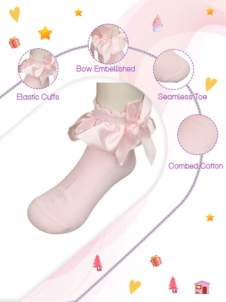 Pink baby sock with labeled features including satin bow, elastic cuffs, seamless toe, and combed cotton benefits.