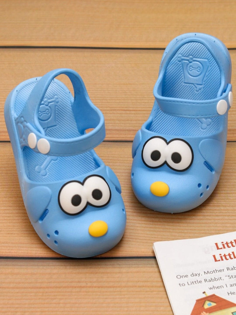 Creative display of Yellow Bee's boys' blue puppy-themed sandals.
