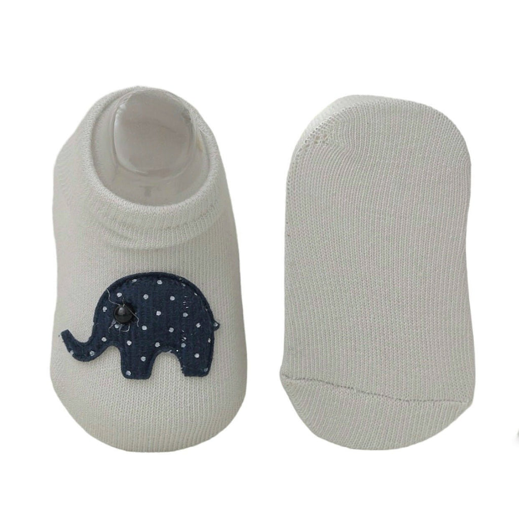 Beige socks with polka dot elephant for baby boy isolated on white Wallpaper.