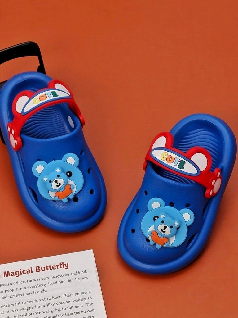 Creative display of Cheerful Blue Bear Clogs for Boys by Yellow Bee