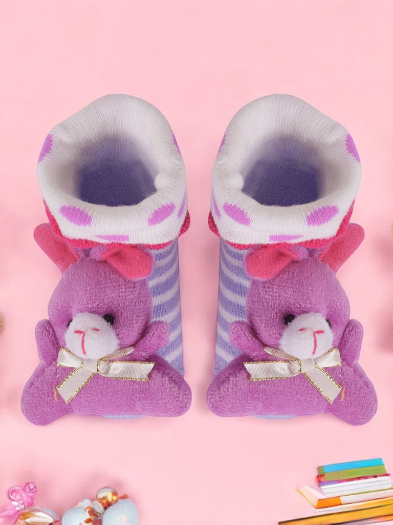 Pair of baby girl's purple leather socks with flower applique and anti-skid sole creative view