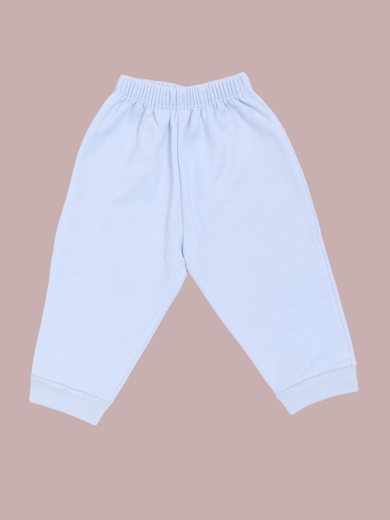 Back view of baby boys' sky blue cotton lounge pants, featuring elastic waistband and cuffs.