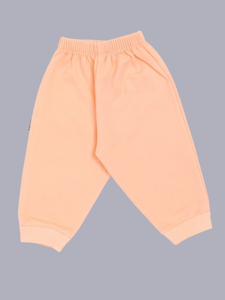 Back view of Child World Interlock Full Length Solid Lounge Pant in Orange for babies