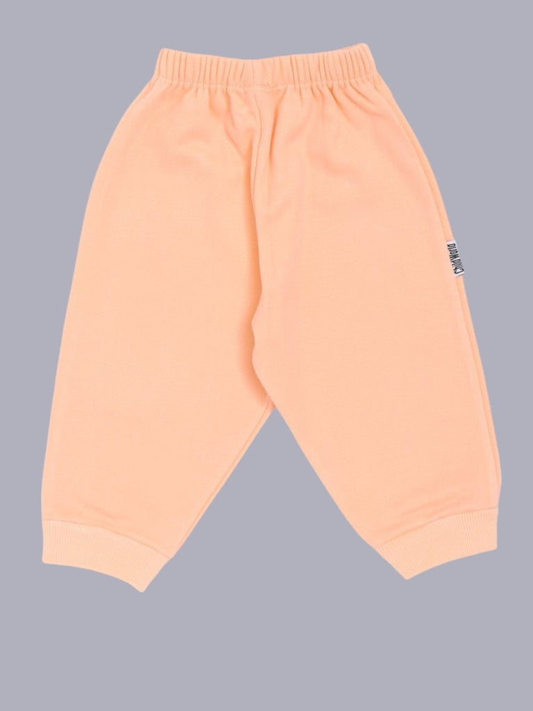 Front view of Child World Interlock Full Length Solid Lounge Pant in Orange for babies