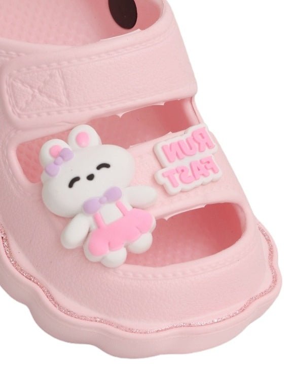 Close-Up of Pink Bunny Decor on Child's Sandals by Yellow Bee