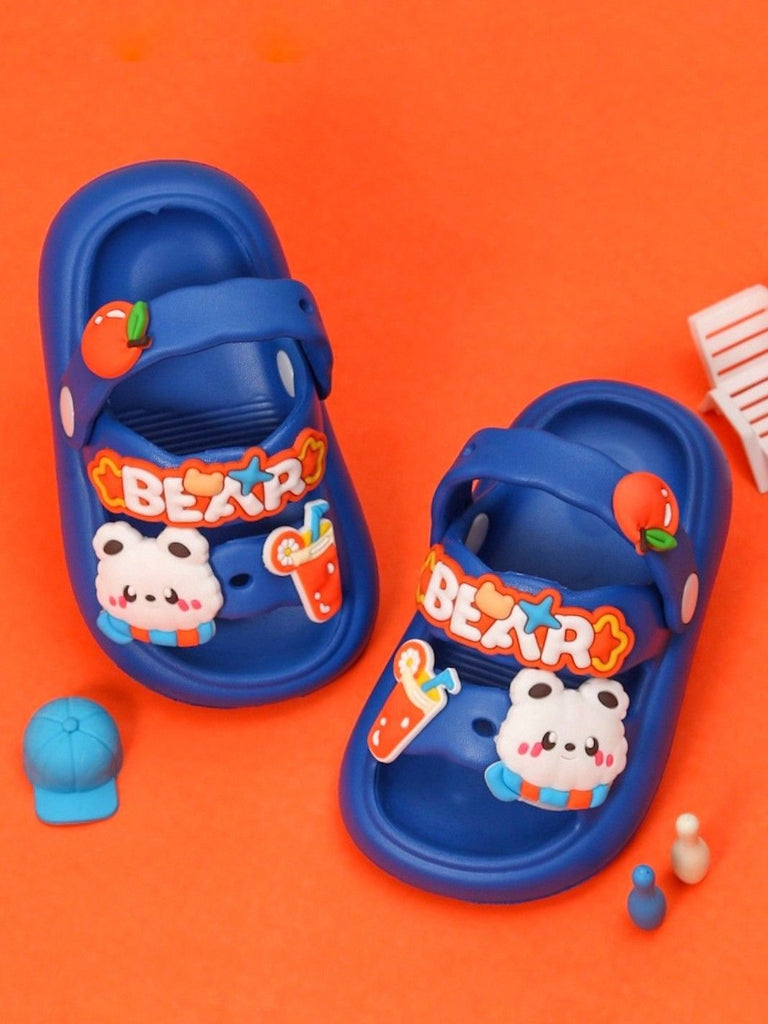 Yellow Bee's blue EVA slides for boys showcased creatively with charms.