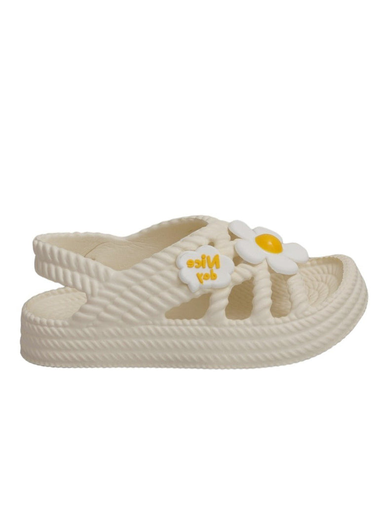 Side view of Yellow Bee's Cream-Colored Sandals, highlighting the sling-back design and comfortable fit
