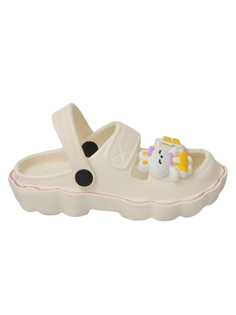 Yellow Bee children's sport sandals in cream, styled with toys, ready for play.
