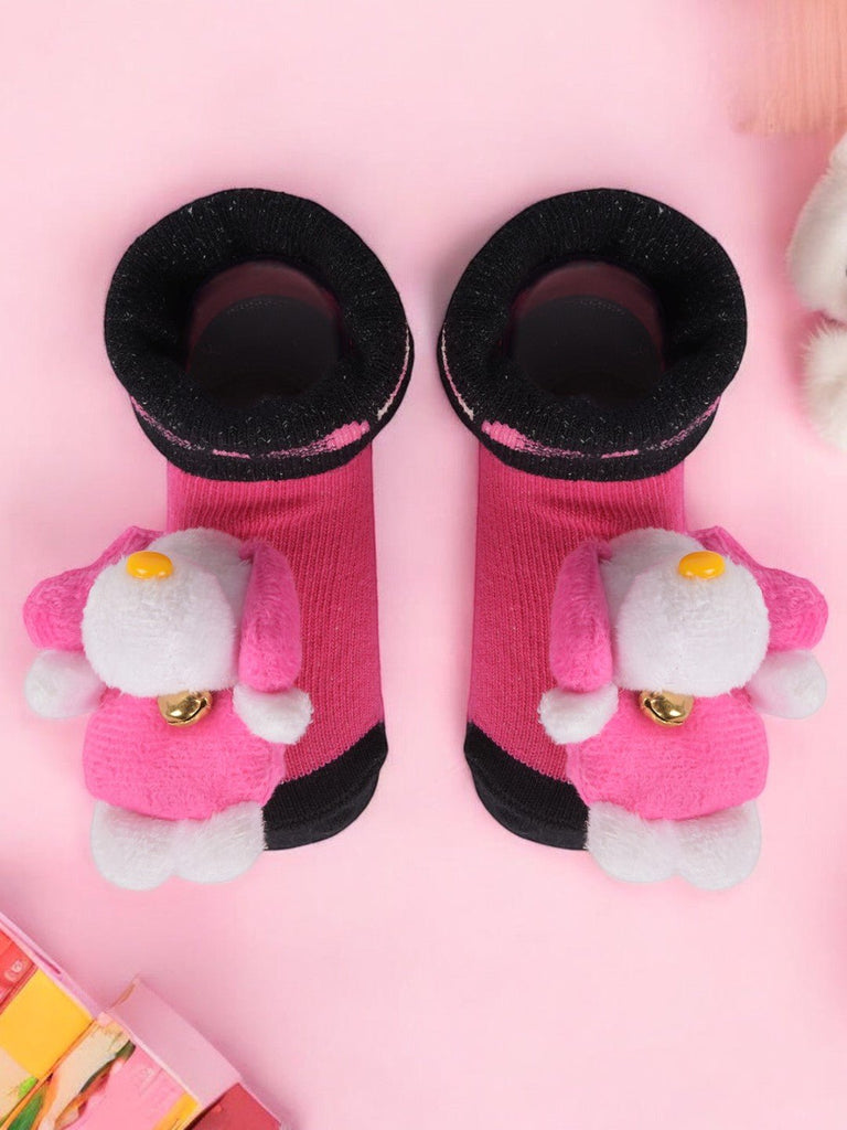 creative view  of teddy bear stuffed toy socks showing insole and upper design.