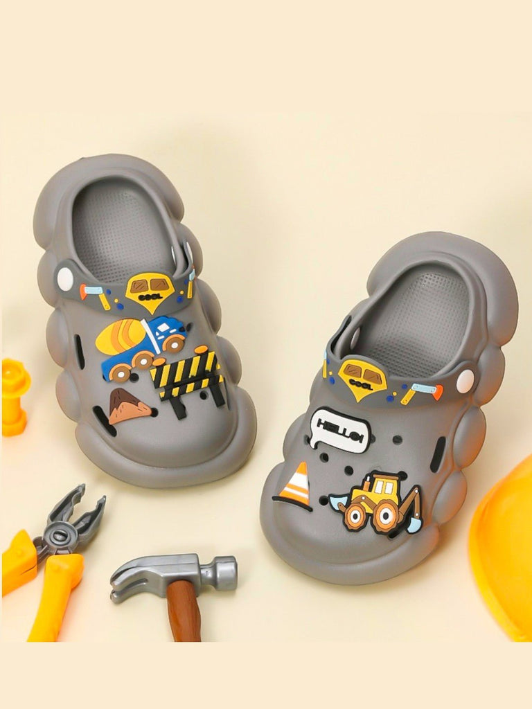 Yellow Bee Grey Clogs for Boys with Colorful Construction Motifs on Display