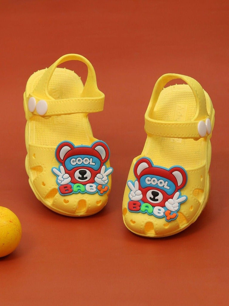 Pair of Yellow Cool Baby Bear Sandals on display for boys.