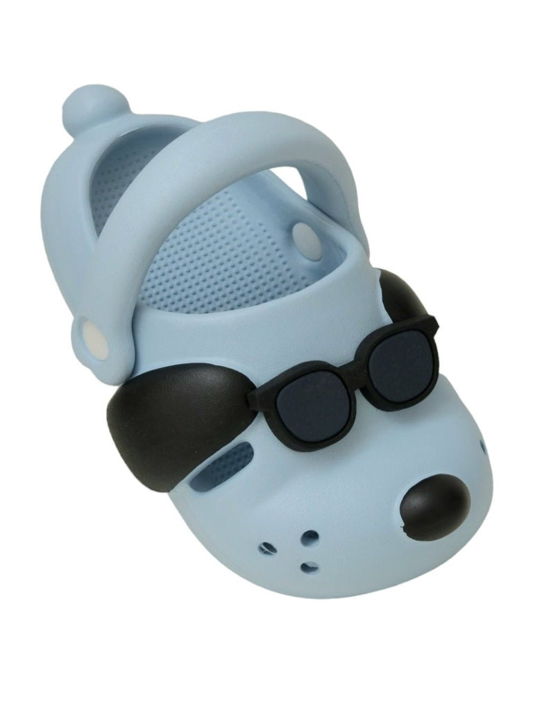 Angle view showcasing the playful sunglasses puppy design and secure sling back style of the Sky Blue Puppy Clogs.