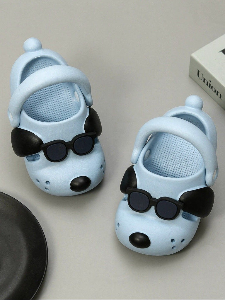 Creative display of the Sky Blue Puppy Clogs with playful elements, showcasing their fun and stylish design.