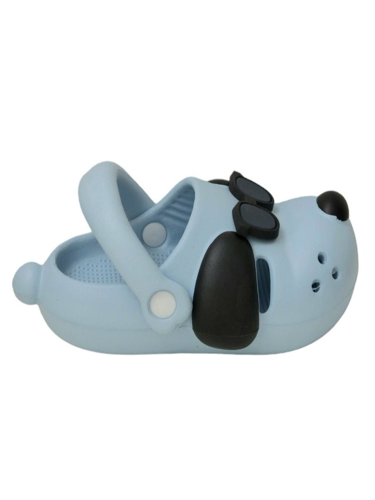 Side view of the Sky Blue Puppy Clogs, illustrating the profile and practical features ideal for energetic play.